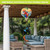Happy Hour Parrot Hot Air Balloon Spinner outdoor decorative item with colorful parrot design.
