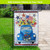 Blue vintage pickup truck garden flag with USA theme flowers and stars on burlap material outdoor decor.