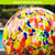 Rainbow Specked Solar LED Glass Gazing Ball with vibrant mosaic patterns in multiple bright colors.