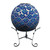 Blue and white scalloped solar LED mosaic gazing ball on a black metal stand with curled legs.
