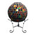 Multicolor Solar LED Glass Gazing Ball on stand with mosaic tiles in red, green, blue, and yellow.