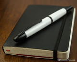 Pilot Vanishing Point Fountain Pen - White with Matte Black Trim - Closed on Notebook 2