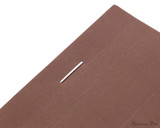 Rhodia No. 16 Premium Notepad - A5, Lined - Chocolate staple detail
