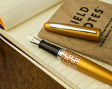 Pilot Metropolitan Fountain Pen - Retro Pop Orange - Open on Notebook