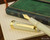 Sailor 1911 Standard Fountain Pen - Ivory with Gold Trim - Open on Notebook