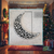 Wooden geometric crescent moon decor with sleek black base and white top, modern celestial wall art for home or office.