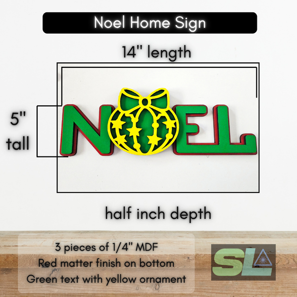 Rectangular wooden sign with red matte background, green matte text spelling “NOEL,” and yellow ornament overlay, measuring 5 inches tall by 14 inches wide.
