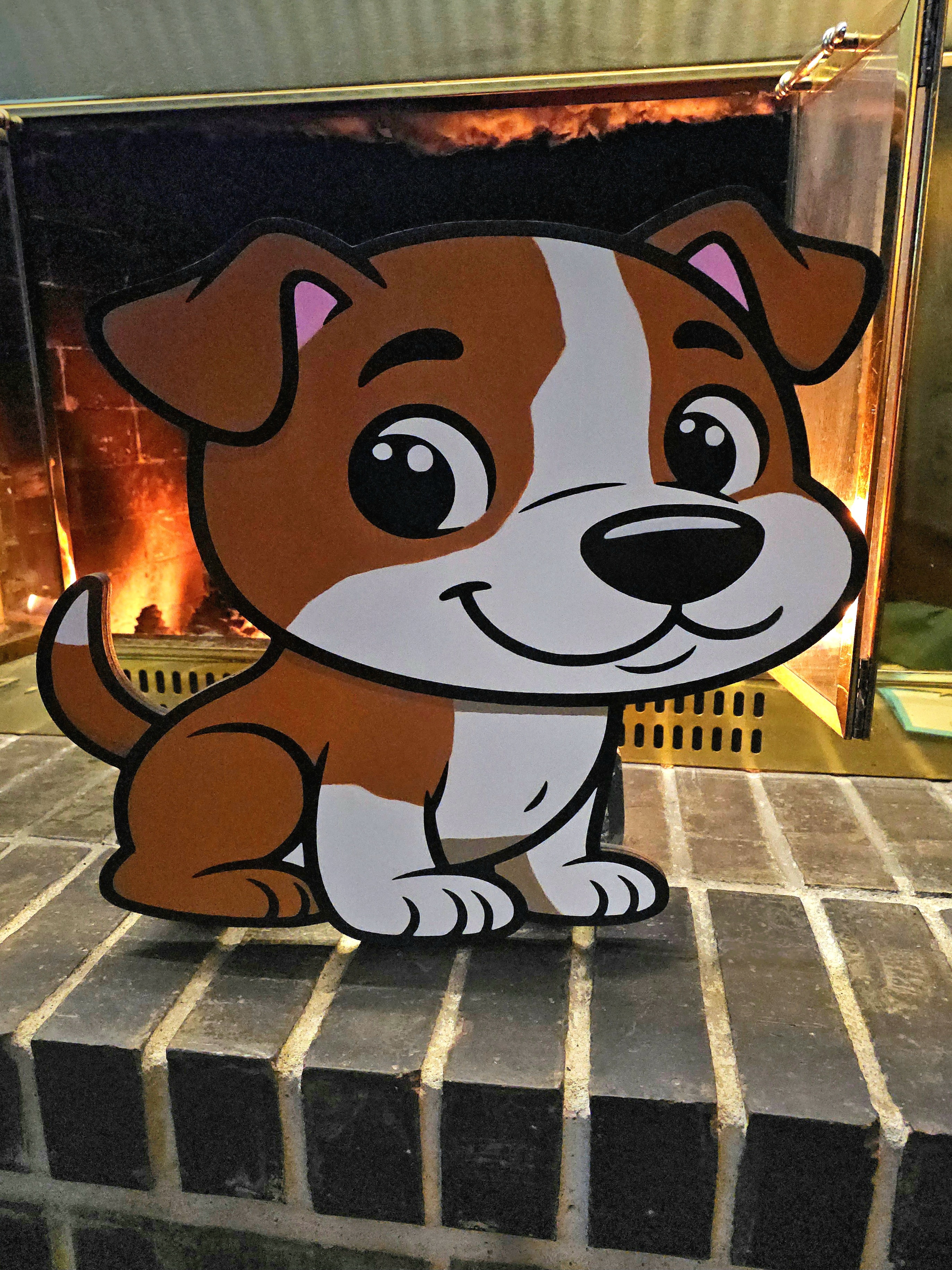 A cute big head dog laser cut, and individual hand-painted pieces.