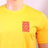 Detail of Hadrian Hundreds official unisex technical T-Shirt. Yellow colour with cut in sleeve and crew neck for a great fit. High quality embroidered official event badge.