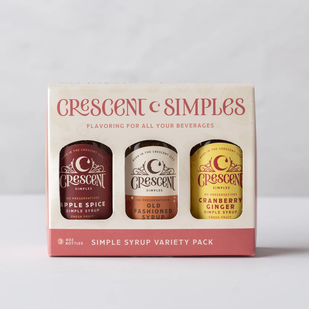 Gift pack of Crescent Simples syrups including Apple Spice, Old Fashioned, and Cranberry Ginger flavors.