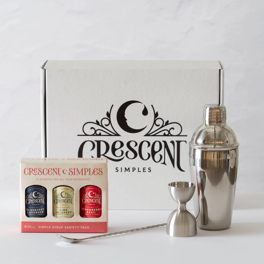 Gift box with a simple syrup 3-pack, jigger, bar spoon, and shaker.