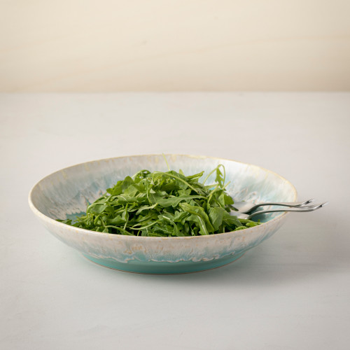 Taormina Aqua Pasta Serving Bowl on table