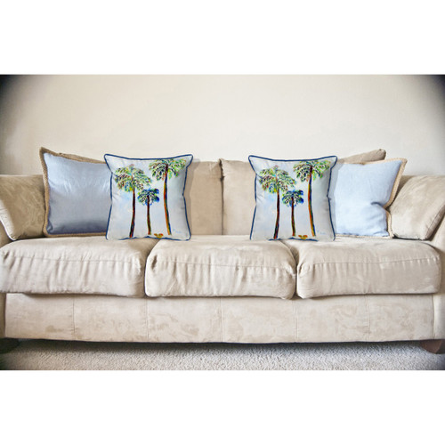 Three Palms Large Indoor-Outdoor Pillow on sofa