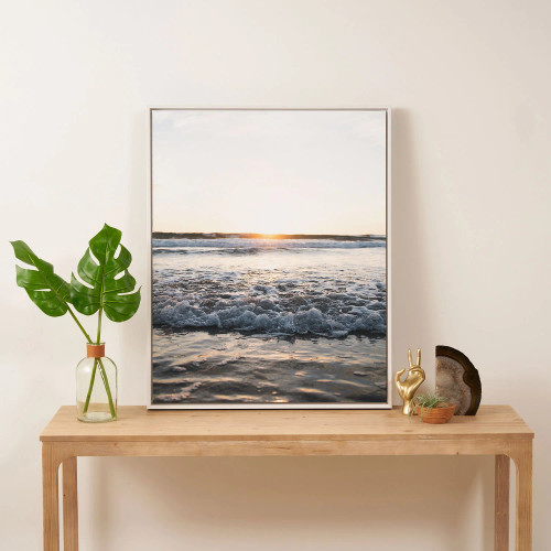 Sundown Art Canvas by Bree Madden in White Frame on table