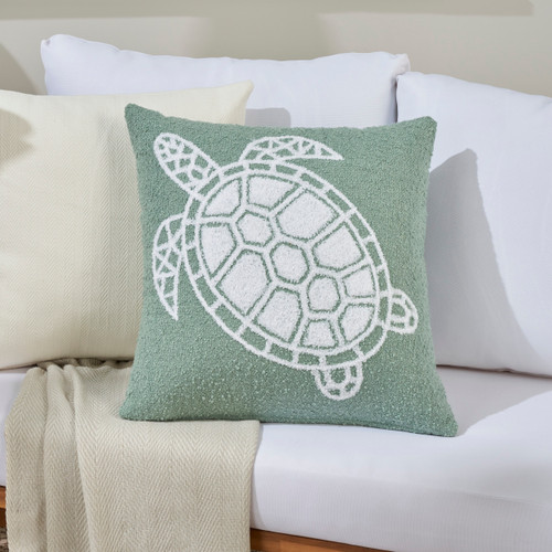 Soft Embroidered Seafoam Green Sea Turtle Indoor-Outdoor Pillow on sofa