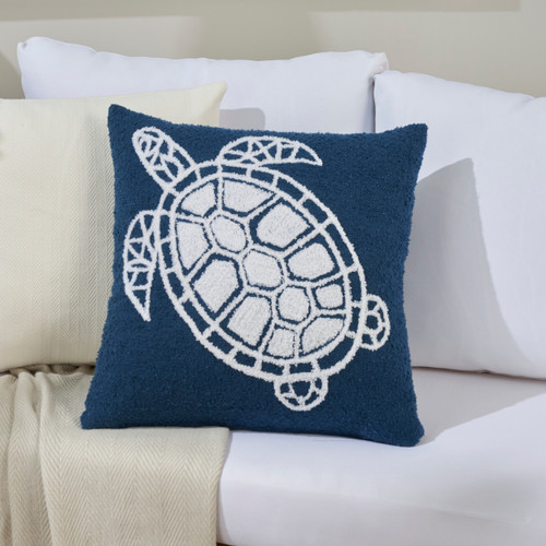 Soft Embroidered Navy Sea Turtle Indoor-Outdoor Pillow on couch