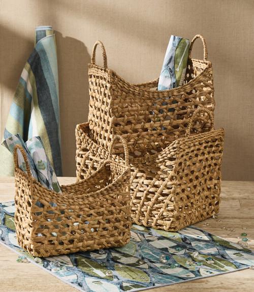 San Juan Set of Three Woven Handled Baskets in entry way