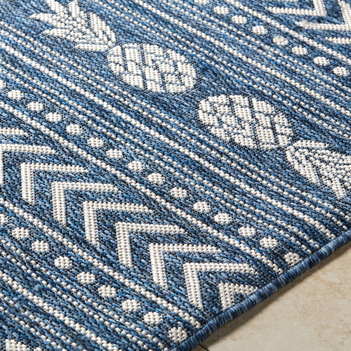 Tropicana Key Dark Blue and Cream Striped Indoor-Outdoor Rug close up edge