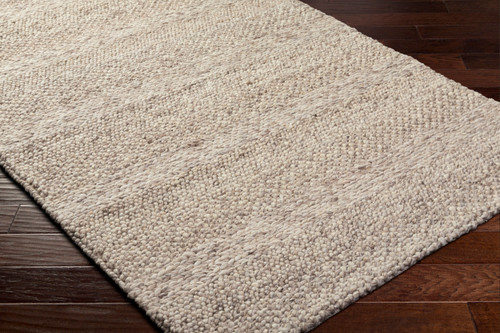 Dune Solace Handwoven Wool Blend Rug on floor