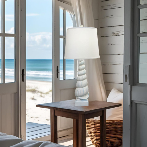 Sugar Beach Spiral Shell Blue-Grey Table Lamp in room