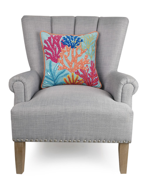 Lanai Tropical Coral Embroidered Pillow on chair