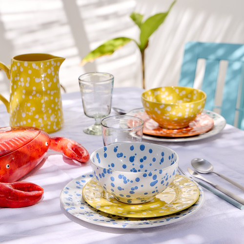 Cornflower Blue Polka Dot Rafaela Cereal Bowl on table with other pieces