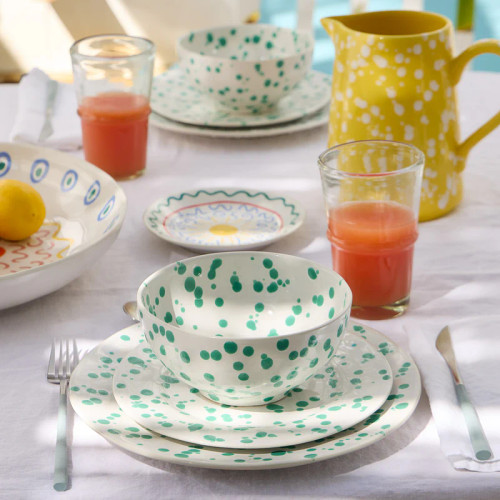 Green and White Polka Dot Rafaela Cereal Bowl on table