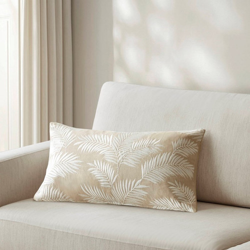 Eloise Linen Palm Embroidered Lumbar Pillow Cover on a sofa