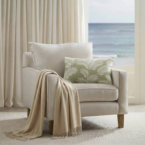 Eloise Green Palm Embroidered Lumbar Pillow Cover on chair