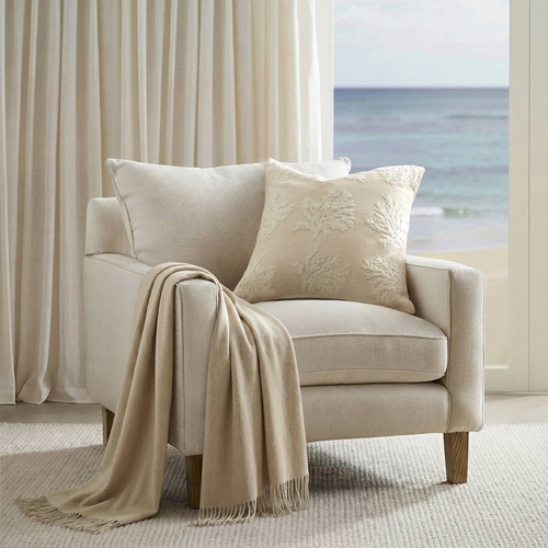 Cammie Coral Motif Ivory Embroidered Square Pillow Cover on chair