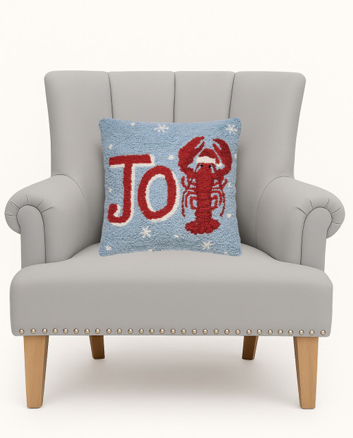 Holiday Joy Lobster Wool Hooked Pillow on chair