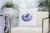 Blue Nautilus Shell Embroidered Throw Pillow room view