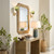 Marina Mirror in Natural Seagrass angle view with Captain's console table