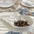Shell Shaped Aparte Divided Serving Dish on table with clams