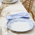 Nantucket White and Blue Striped Dinner Plate on table