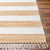 Sailor Striped Sand and White Area Rug corner with fringe