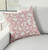 Arielle Coral Starfish and Wave Reversible Throw Pillow on sofa
