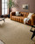 Kimi Dark Sand Soft Woven Jute Rug with Fringe room view