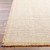 Kimi Light Sand and Soft Taupe Woven Rug with Fringe corner