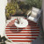 Beach Club Cabana Red Striped Area Rug round outside