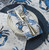  Atlantic Blue Crab 20 x 20 Cotton Napkins - Set of Four close up on table