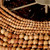 Clamshell Mango Wood Beaded Chandelier close up beads