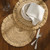 Raffia Trimmed 15 inch Round Placemats - Set of Four on table 2