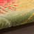 Santa Cruz Bright Palms Sculpted Indoor-Outdoor Area Rug roll