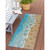 Baby Turtle Escape Indoor-Outdoor Accent Rug on patio