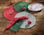 Essex Woven Green Round Set of Four Place Mats with red and more green