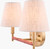 Mistral 2-Light Brass and Rattan Wall Sconce lights on