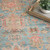 Normandy Park Blue Vintage Washable Area Rug close up on floor