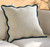 Calypso Scallop Pillow with Teal Velvet Trim on sofa
