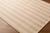 Harborside Ivory Striped Outdoor Safe Rug on floor
